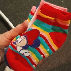 6 pack of Disney's Minnie mouse slipper socks. Size 6-10 kids